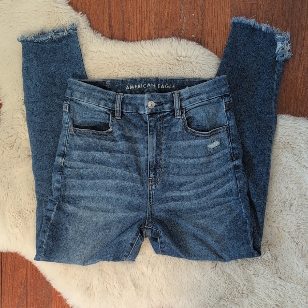 American Eagle Outfitters High Rise Blue Jeans with Distressed Hem